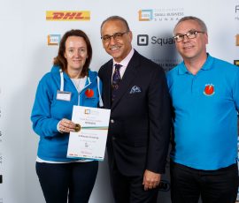 SBS Winner two 4 minutes staff being presented with a certificate by theo paphitis
